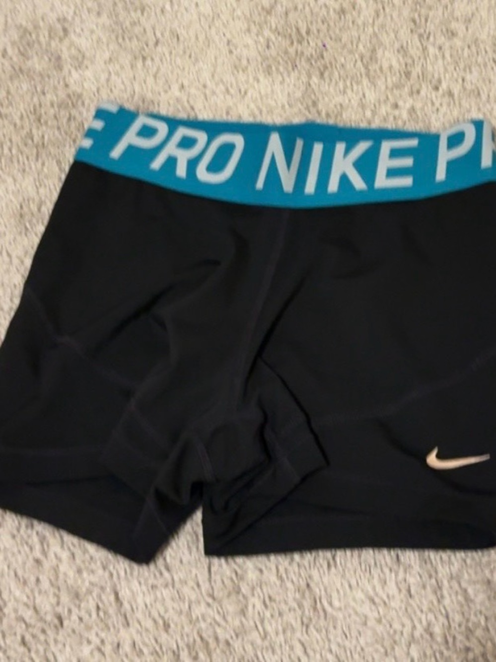Nike Women's Black Compression Bike Shorts with Teal Logo Waistband